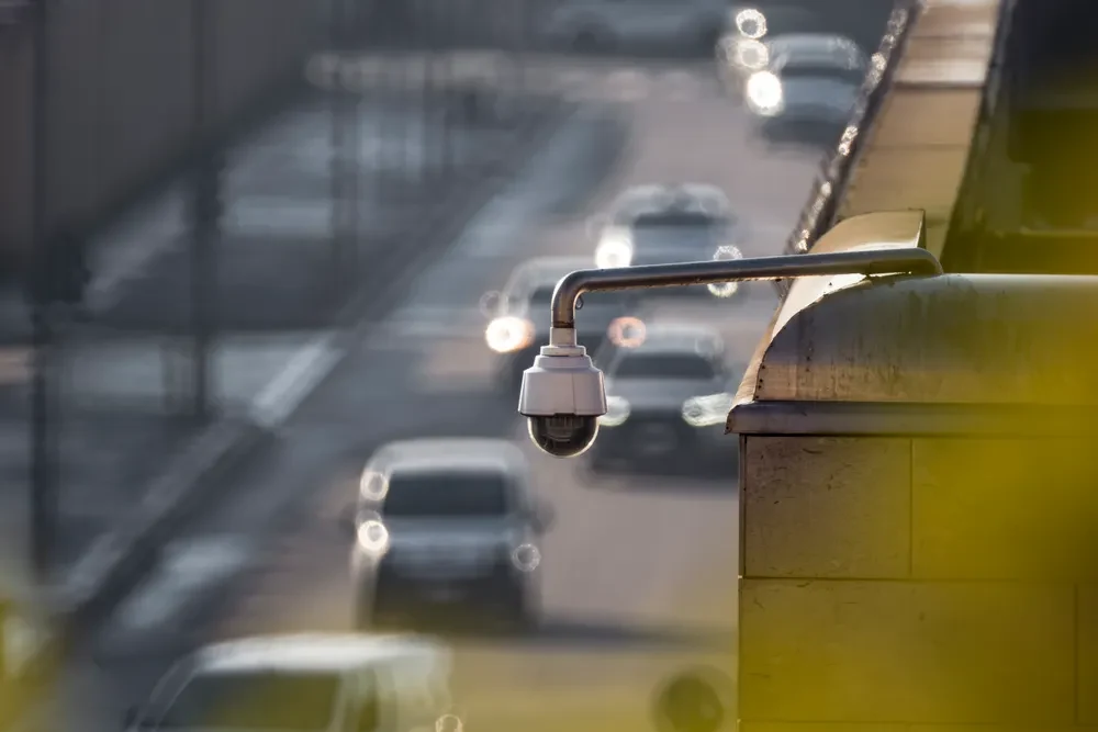 An outdoor security camera; illustrative stock photograph by tommy picone / Pexels.